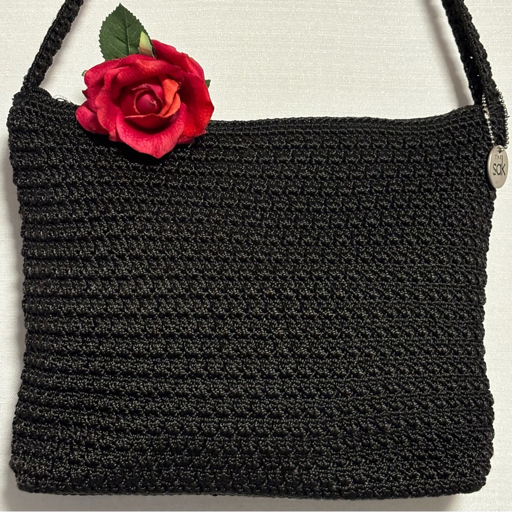 The Sak Black Crocheted shoulder bag with tag zips closed 12X9X2.5 LIKE NEW